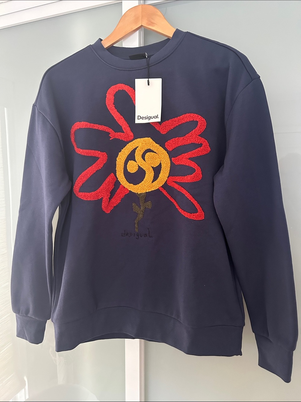 Desigual Navy Sweatshirt with Red & Yellow Floral Emblem
